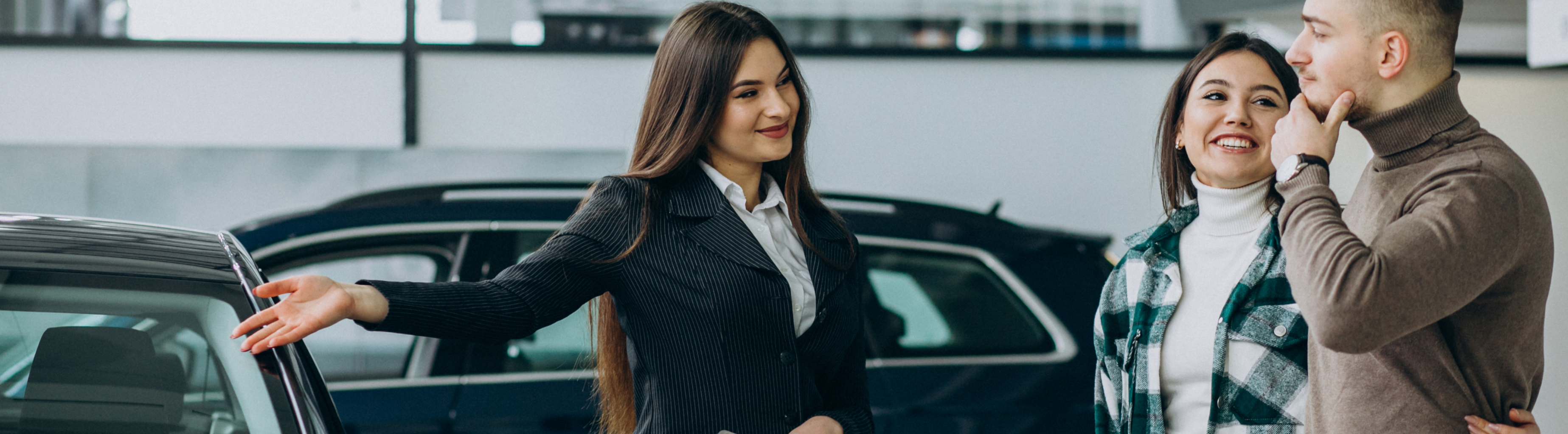 Young Couple Choosing Car