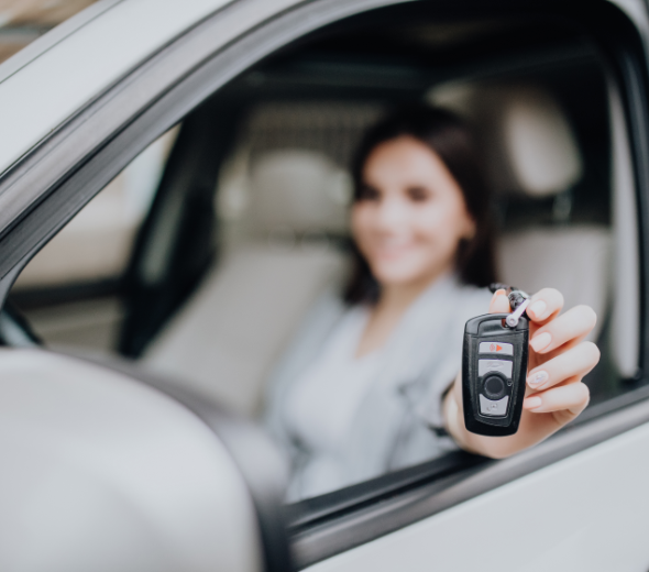 Young Happy Woman New Car