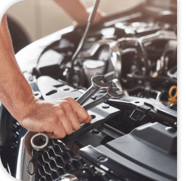 Hyundai service technician working on a vehicle